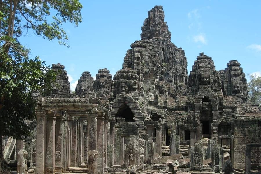 Ancient temple ruins at Angkor Wat, showcasing intricate stone architecture and historical significa.