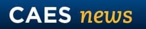 CAES news logo with bold white letters for "CAES" and stylized orange letters for "news" on a blue background.