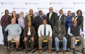 Group of diverse professionals at NC A&T Cooperative Extension event.