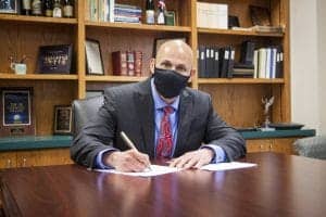 Surry Community College President David Shockley, Ed.D., signed the agreements on behalf his college.