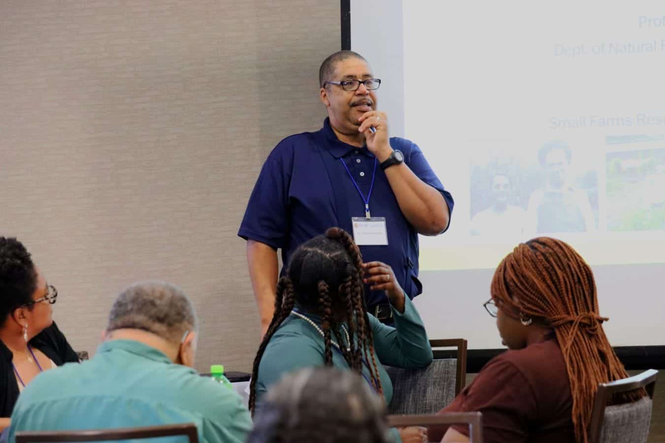 Expert speaker presenting at CAES News conference on natural resources.