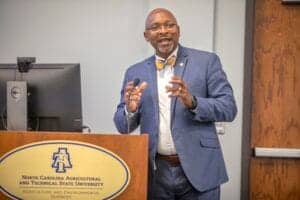 Engaged male speaker presenting at North Carolina Agricultural and Technical State University.