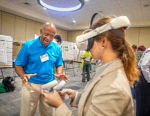 Innovative virtual reality technology demonstration at a professional event.