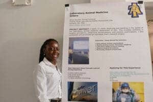 Laboratory Animal Medicine Intern poster at CAES News event.
