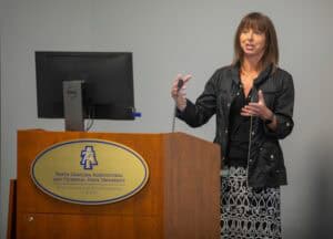 Woman giving presentation at North Carolina Agricultural and Technical State University.