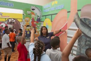 Healthy lungs awareness event with children engaging in educational activities about respiratory hea.