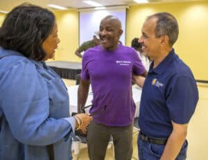 Enhancing community health through engagement and support at CAES News event.