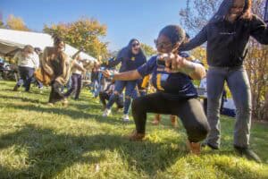 Enjoying outdoor team-building activities at CAES News fall festival.