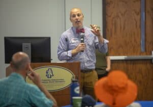 Engaged speaker presenting at Carolina Agricultural and Technical State University event.