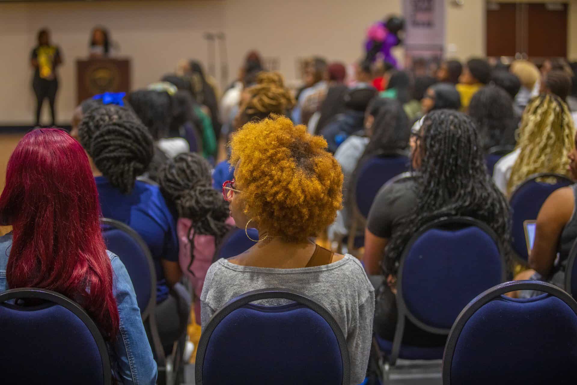 Empowered women attending a conference on diversity and inclusion.