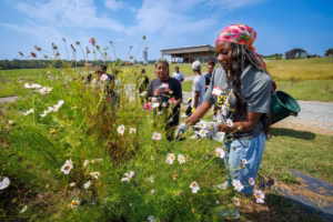 A group of people in a field.